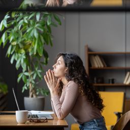 Bored unmotivated female worker sit at office desk with laptop tired of looking for problem solution, businesswoman need inspiration to make monotonous work or uninteresting task. Lack of motivation